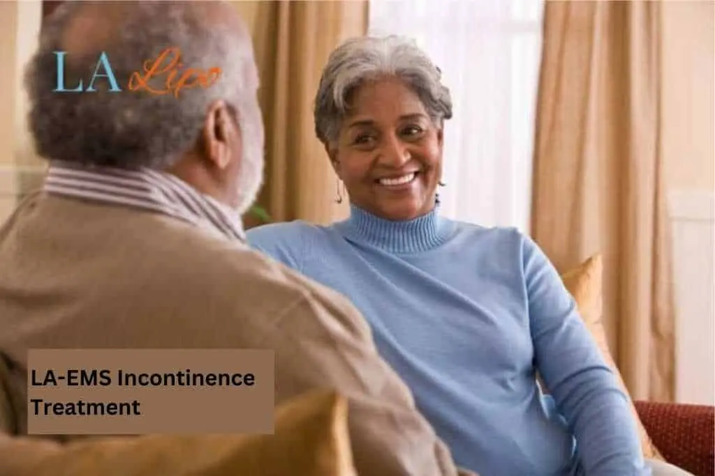 Couple sat smiling at each other - LA-EMS treatment Streatham